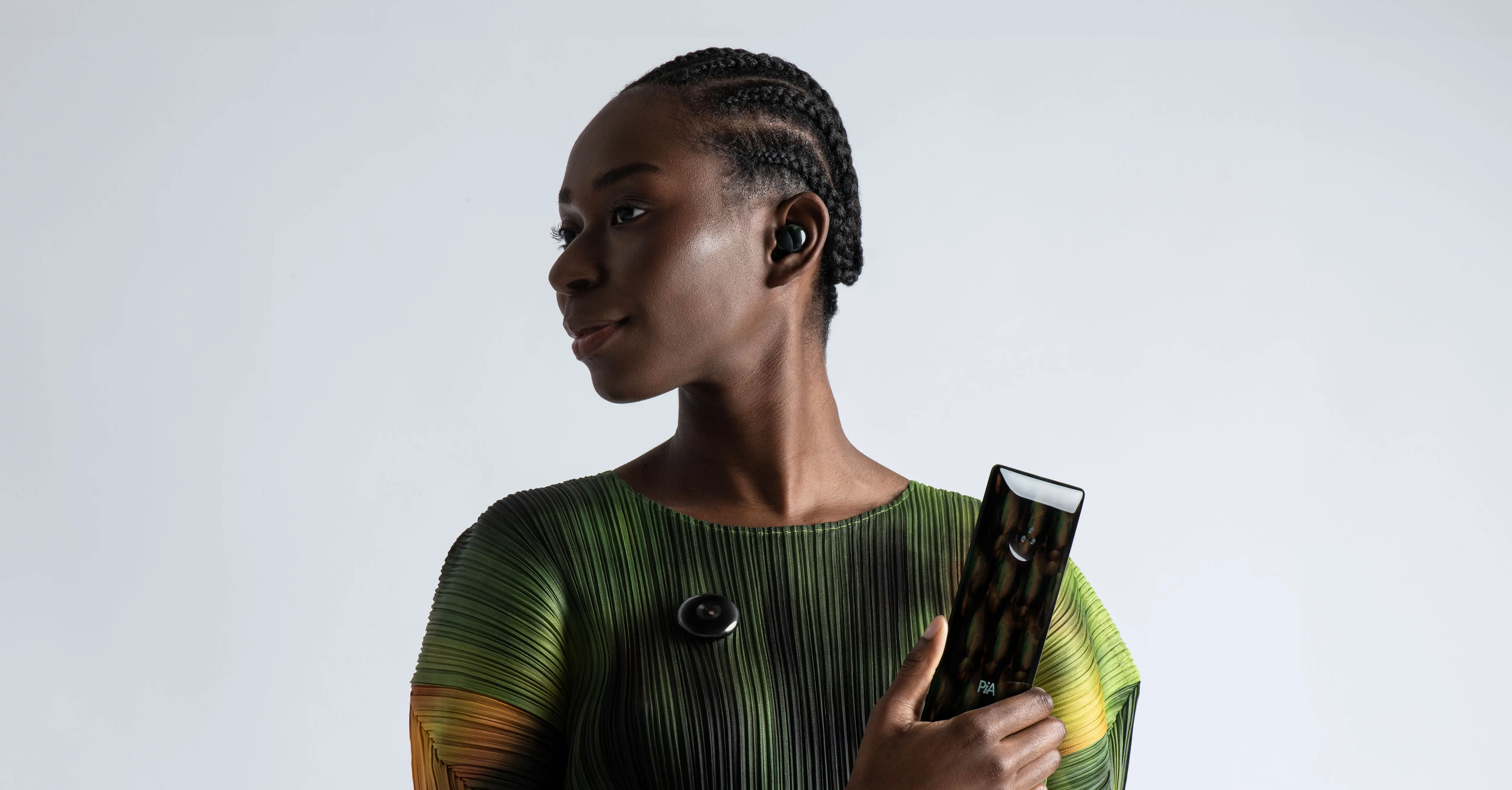PiA is a digital-first ecosystem of hardware that redefines our relationship with artificial intelligence, a suite of intelligent devices – including a smartphone, biometric earbud, and wearable camera module. Designed by leading industrial design studio LAYER.