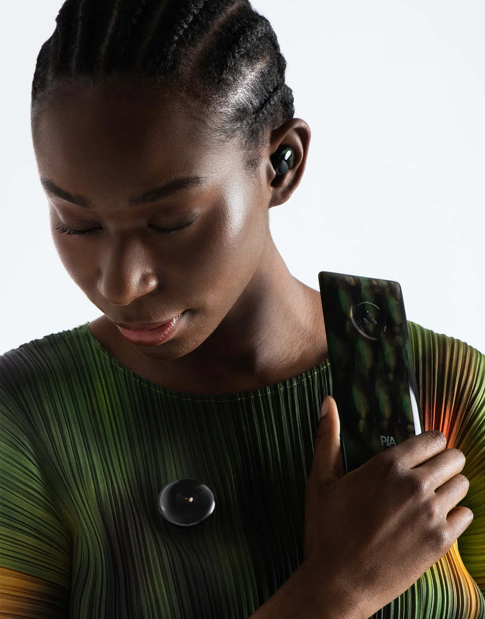 PiA is a digital-first ecosystem of hardware that redefines our relationship with artificial intelligence, a suite of intelligent devices – including a smartphone, biometric earbud, and wearable camera module. Designed by leading industrial design studio LAYER.