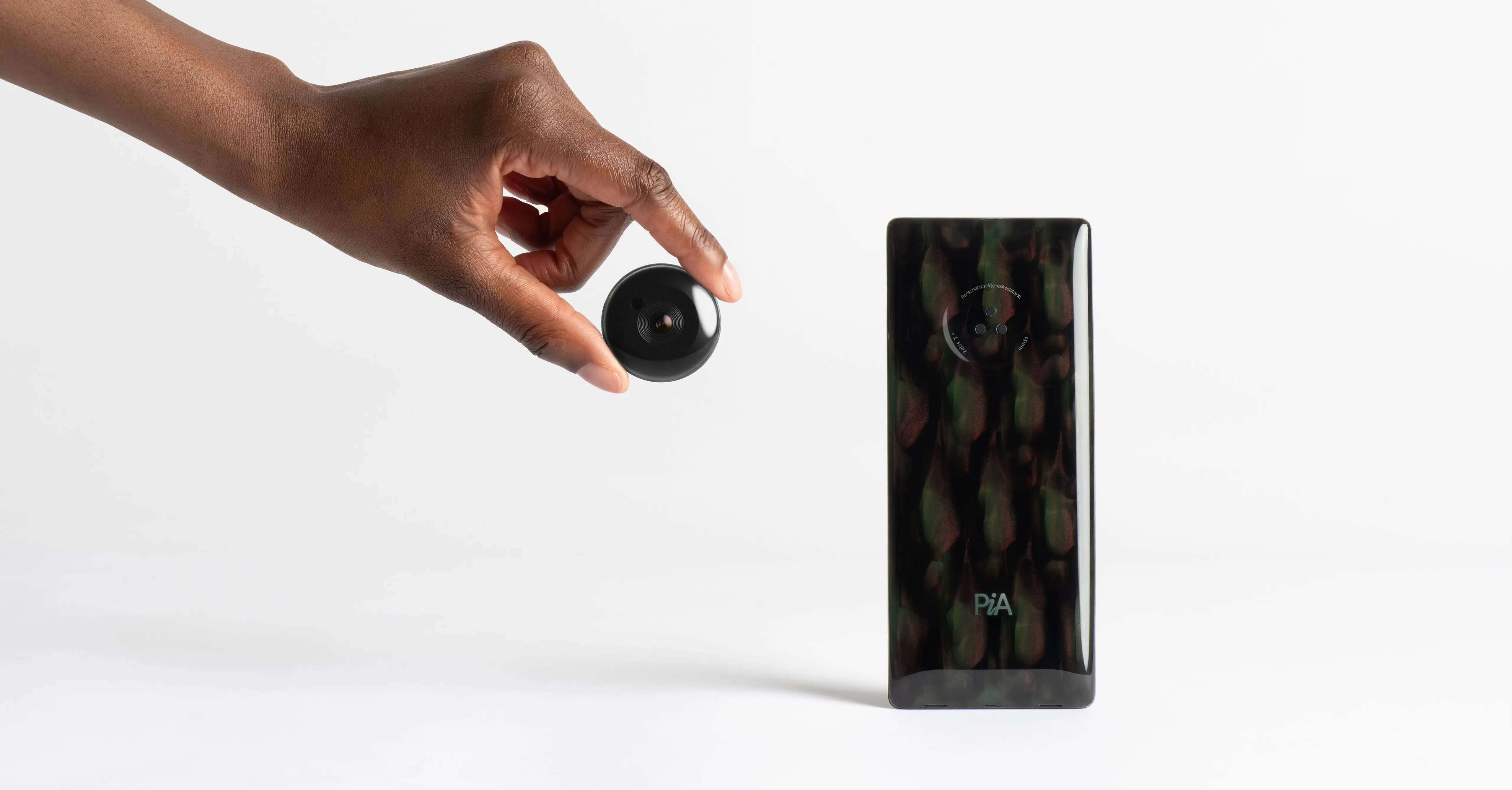 PiA is a digital-first ecosystem of hardware that redefines our relationship with artificial intelligence, a suite of intelligent devices – including a smartphone, biometric earbud, and wearable camera module. Designed by leading industrial design studio LAYER.