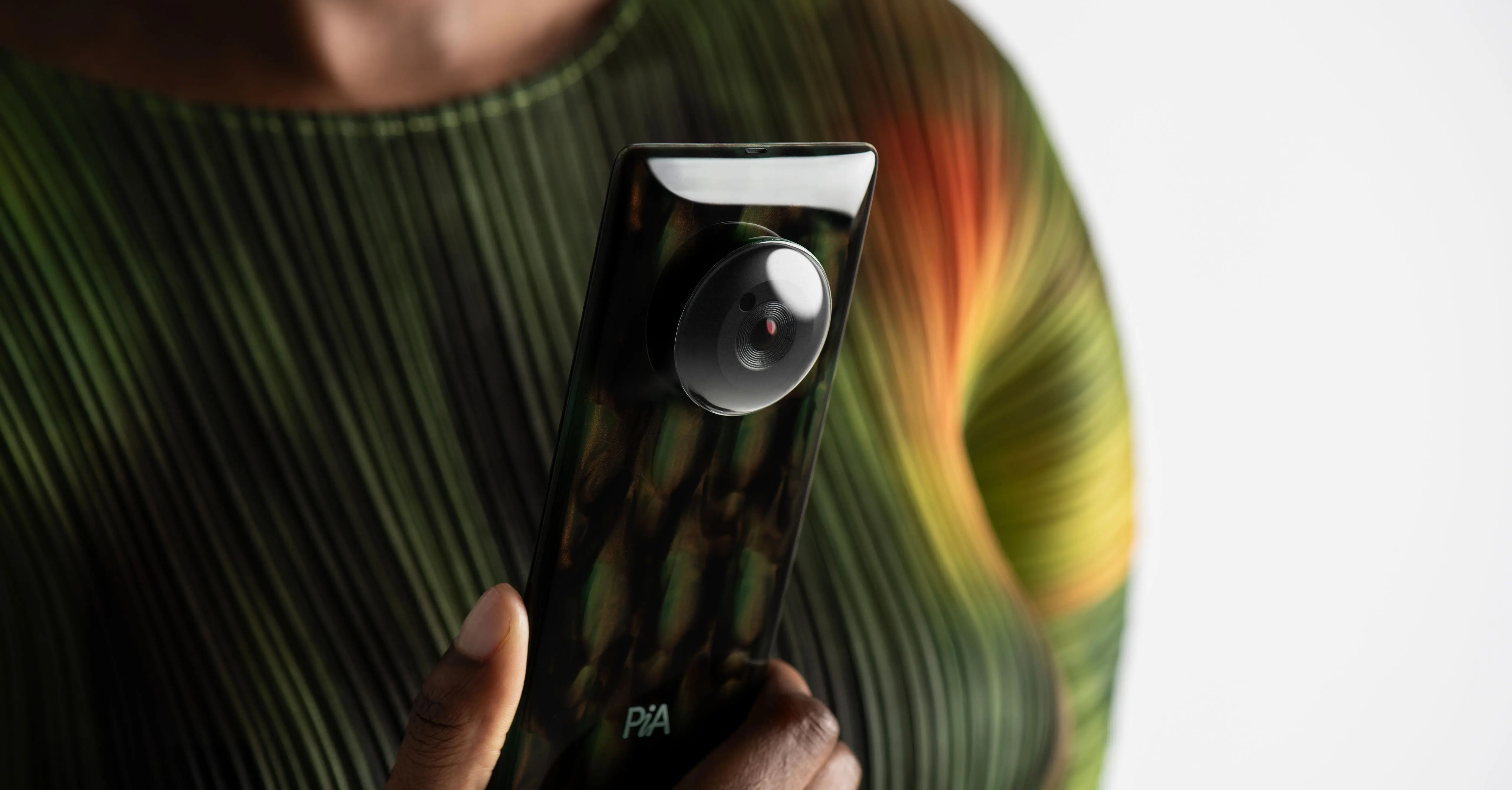 PiA is a digital-first ecosystem of hardware that redefines our relationship with artificial intelligence, a suite of intelligent devices – including a smartphone, biometric earbud, and wearable camera module. Designed by leading industrial design studio LAYER.