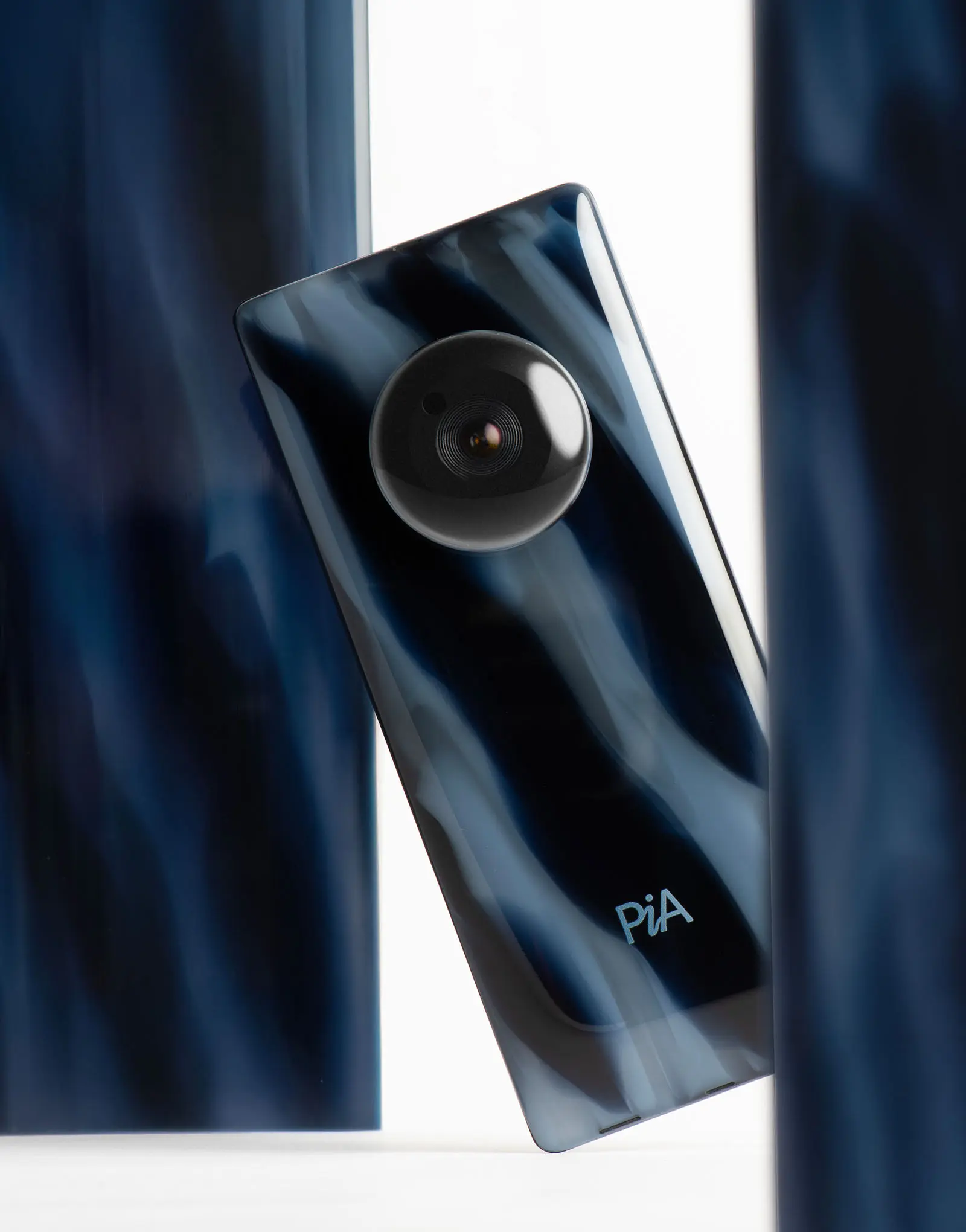 PiA is a digital-first ecosystem of hardware that redefines our relationship with artificial intelligence, a suite of intelligent devices – including a smartphone, biometric earbud, and wearable camera module. Designed by leading industrial design studio LAYER.