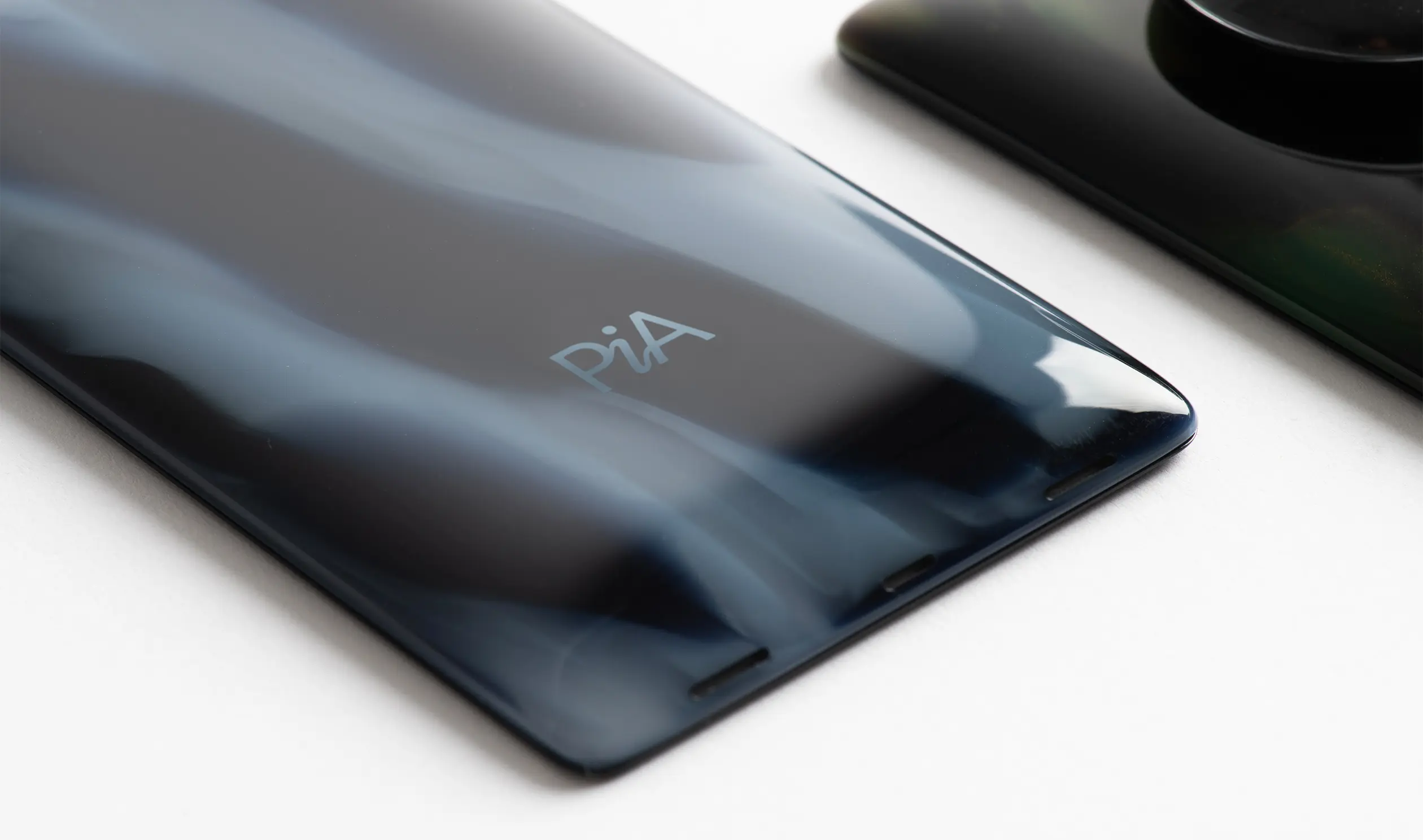 PiA is a digital-first ecosystem of hardware that redefines our relationship with artificial intelligence, a suite of intelligent devices – including a smartphone, biometric earbud, and wearable camera module. Designed by leading industrial design studio LAYER.