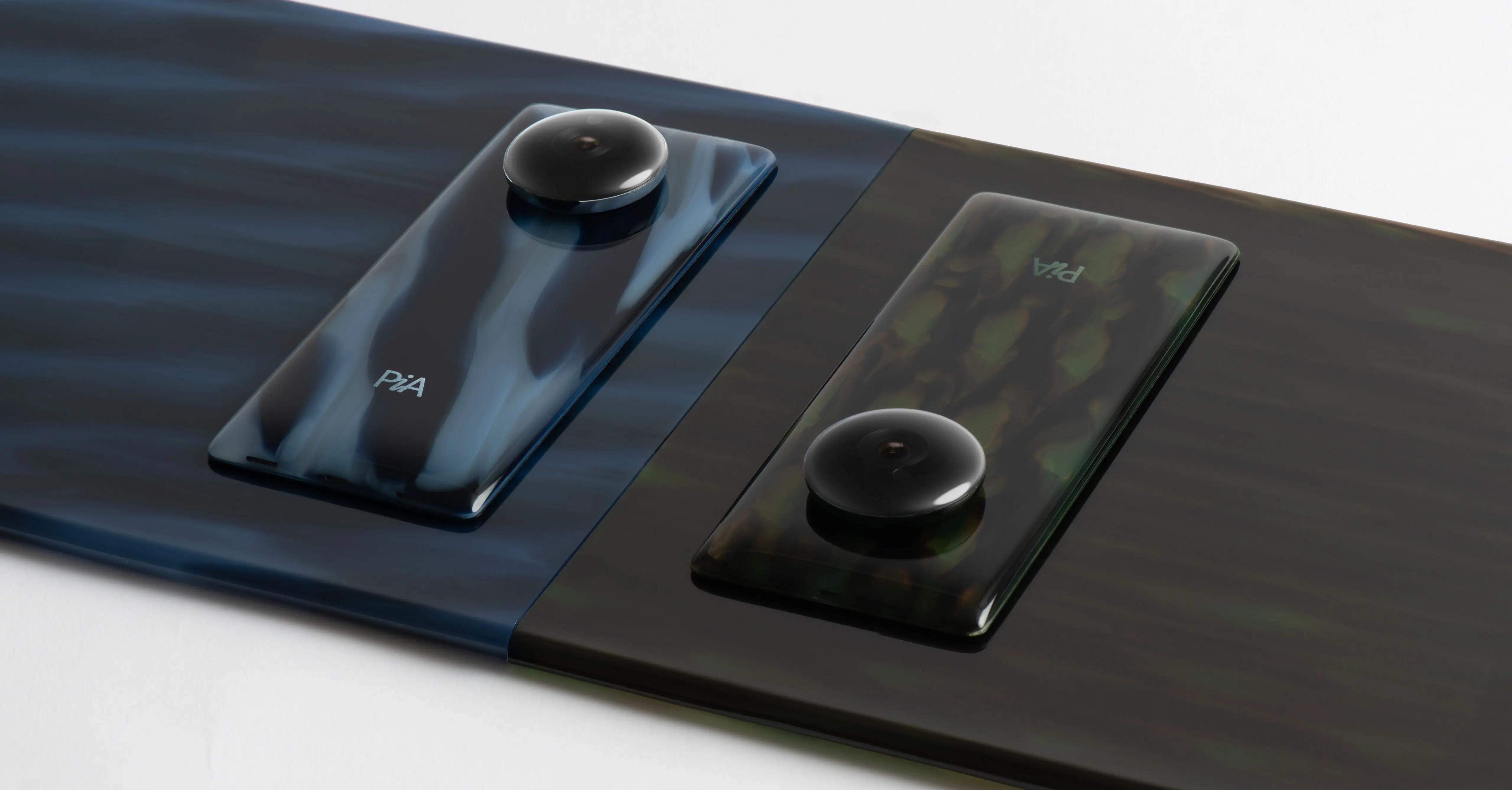 PiA is a digital-first ecosystem of hardware that redefines our relationship with artificial intelligence, a suite of intelligent devices – including a smartphone, biometric earbud, and wearable camera module. Designed by leading industrial design studio LAYER.