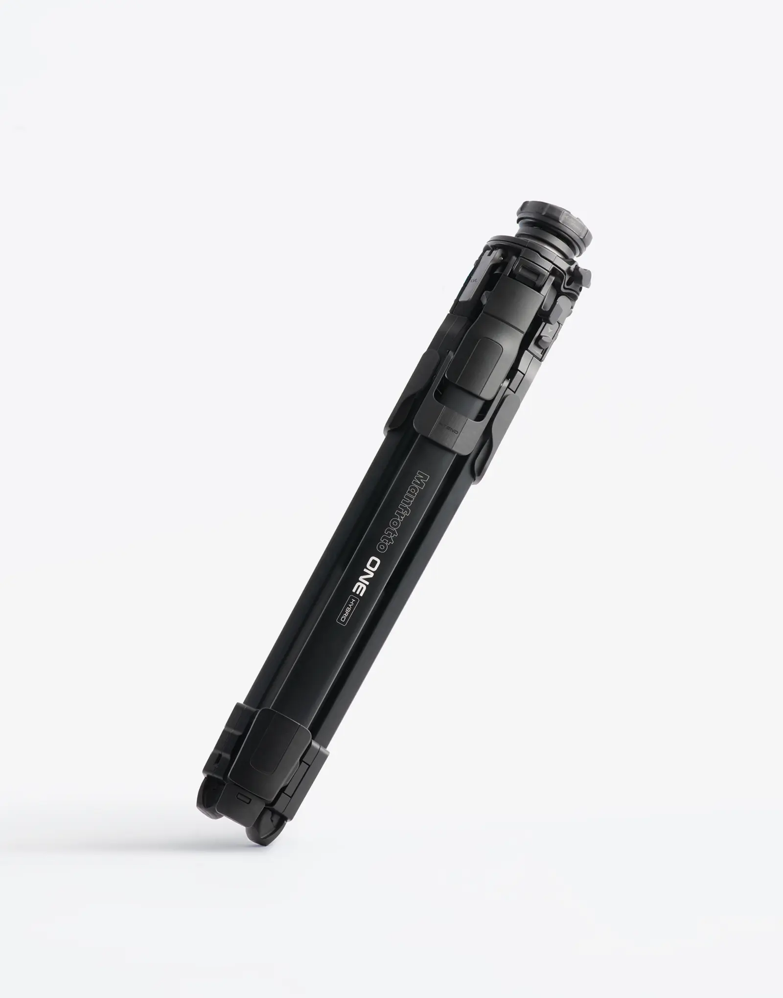 The ONE tripod by leading industrial design consultancy LAYER shown folded at an angle on a white background.