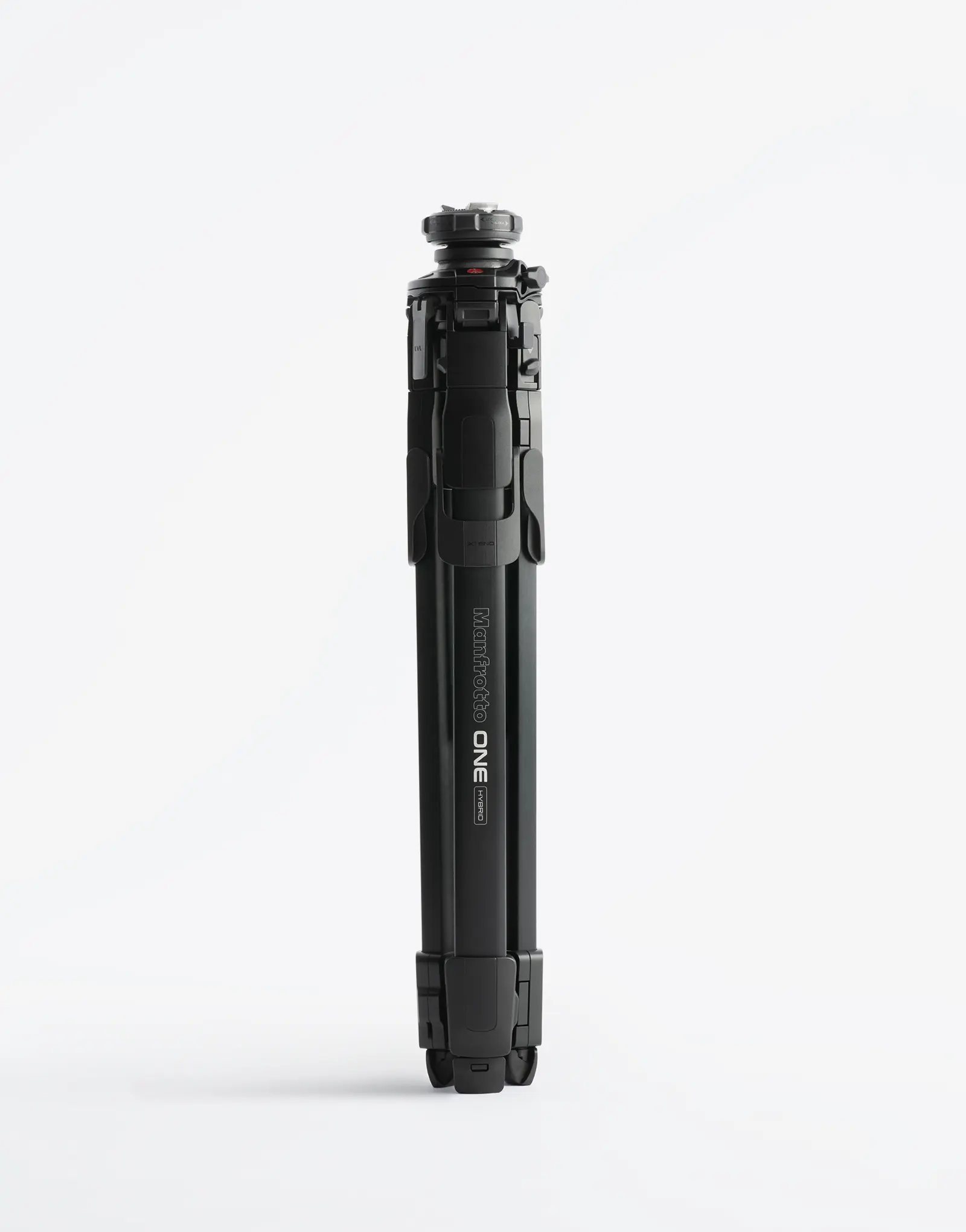 The ONE tripod by leading industrial design consultancy LAYER shown folded upright against a white background.
