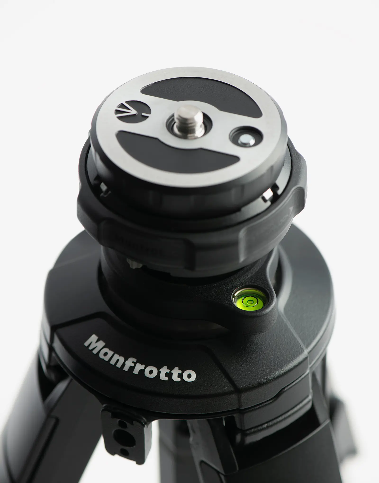 Close-up of the ONE tripod by leading industrial design consultancy LAYER showing the tripod head and built-in spirit level on a white background.